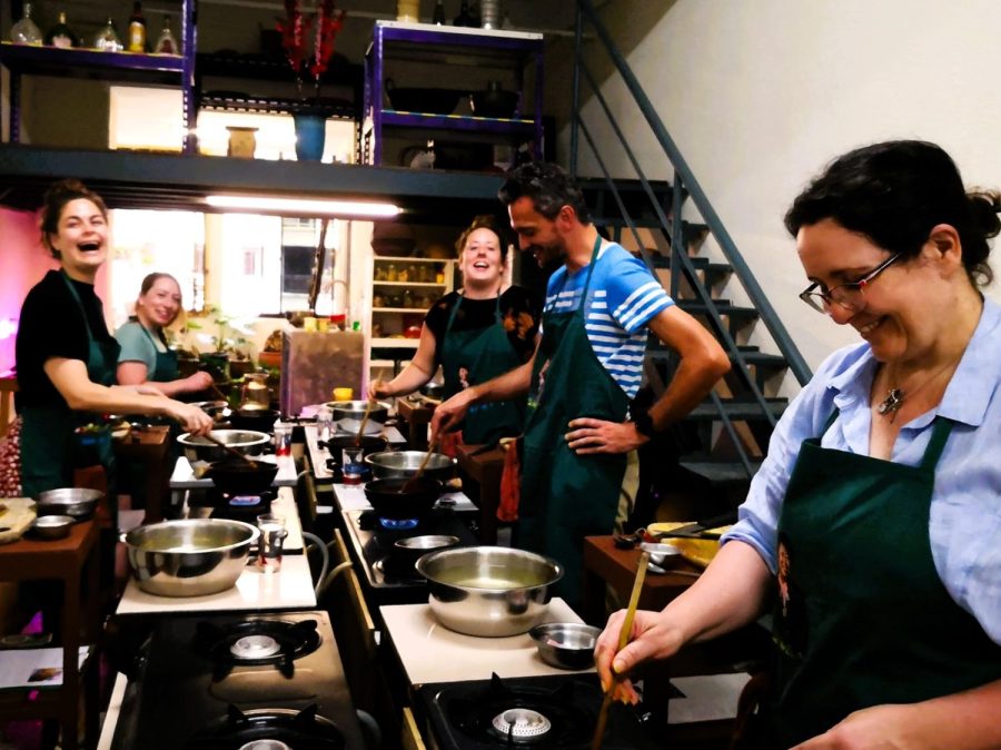 Photo of people enjoying a cooking class