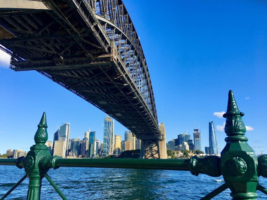 image of Sydney Harbour Bridge from underneath and looking across to the city